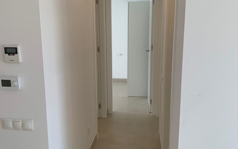PISO DE 3 HABITACIONES  DE OBRA NUEVA TERMINADA CON PISCINA  A ESTRENAR A LAS AFUERAS DE SAN ANTONIO